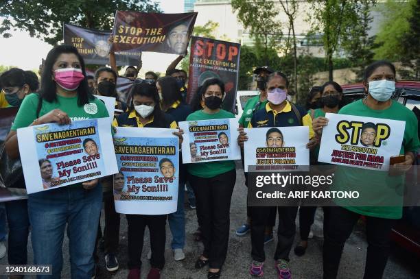 Activists protest against the planned execution of Nagaenthran K. Dharmalingam, a mentally disabled Malaysian man sentenced to death for trafficking...