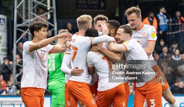 Blackpool's Gary Madine celebrates scoring his side's first goal with his team mates during the Sky Bet Championship match between Luton Town and...