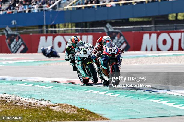 Philipp Oettl from Germany and Ducati Panigale V4R and Xavi Vierge from Spain and Honda CBR 1000 RR-R during the World Superbike Race 1 at Assen TT...