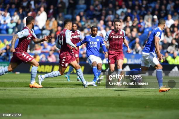 Ademola Lookman of Leicester City in action with John McGinn of Aston Villa and Jacob Ramsey of Aston Villa during the Premier League match between...