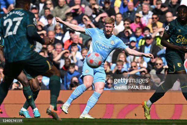 Manchester City's Belgian midfielder Kevin De Bruyne passes the ball during the English Premier League football match between Manchester City and...