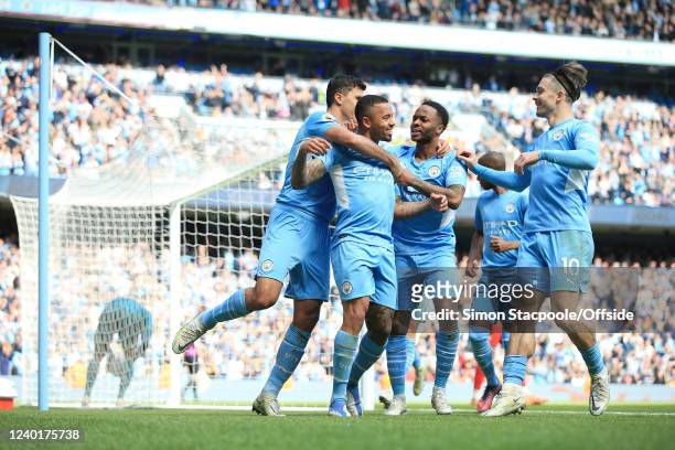 Gabriel Jesus of Manchester City celebrates with Rodri of Manchester City , Raheem Sterling of Manchester City and Jack Grealish of Manchester City...