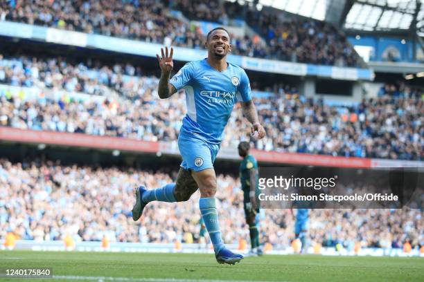 Gabriel Jesus of Manchester City celebrates after scoring their 5th goal during the Premier League match between Manchester City and Watford at...