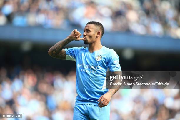 Gabriel Jesus of Manchester City sucks his thumb as he celebrates after scoring their 4th goal during the Premier League match between Manchester...