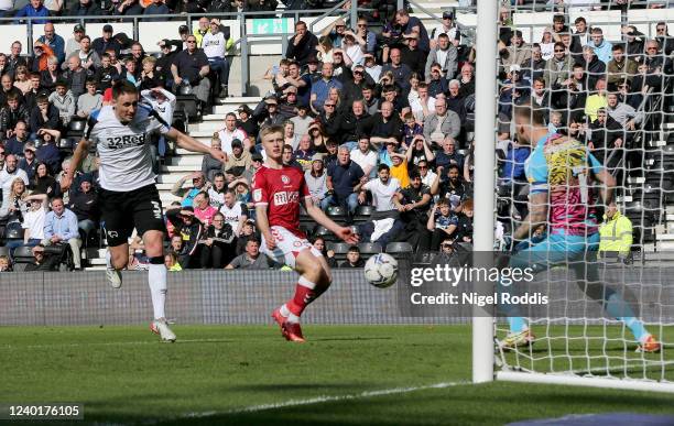 Craig Forsyth of Derby County heads to score during the Sky Bet Championship match between Derby County and Bristol City at Pride Park Stadium on...