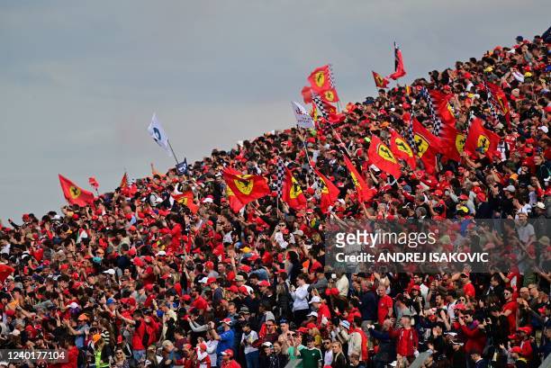 Ferrari and other Formula One fans watch the sprint race at the Autodromo Internazionale Enzo e Dino Ferrari race track in Imola, Italy, on April 23...