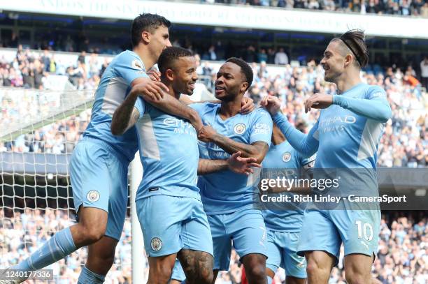 Manchester City's Gabriel Jesus is mobbed by team-mates as he celebrates scoring his sides fourth goal from the penalty spot during the Premier...