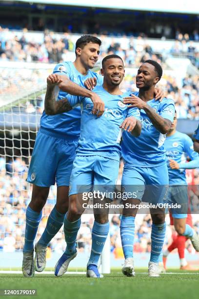 Gabriel Jesus of Manchester City celebrates with Raheem Sterling of Manchester City and Rodri of Manchester City after scoring their 4th goal during...