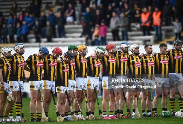 Kilkenny , Ireland - 23 April 2022; Kilkenny players observe a moments silence in honour of the late Galway camogie player Kate Moran before the...