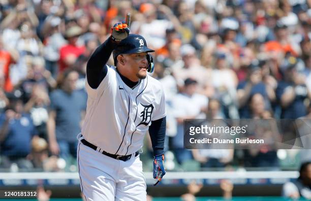 Miguel Cabrera of the Detroit Tigers celebrates after getting his 3,000th hit during the first inning of a game against the Colorado Rockies at...
