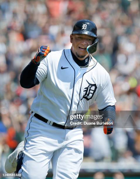 Miguel Cabrera of the Detroit Tigers pumps his fist after getting his 3,000th hit during the first inning of a game against the Colorado Rockies at...