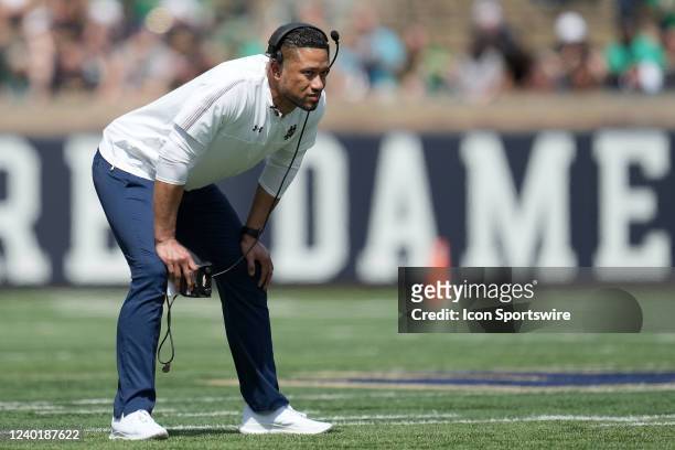 Notre Dame Fighting Irish head coach Marcus Freeman looks down field in action during the Notre Dame Blue-Gold Spring Football Game on April 23, 2022...