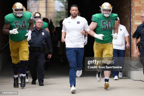 Notre Dame Fighting Irish head coach Marcus Freeman looks on as he takes the field in action during the Notre Dame Blue-Gold Spring Football Game on...