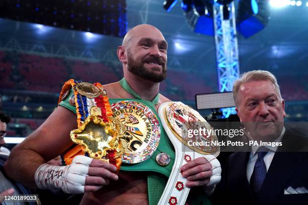 Tyson Fury following victory over Dillian Whyte with Promoter, Frank Warren at Wembley Stadium, London. Picture date: Saturday April 23, 2022.