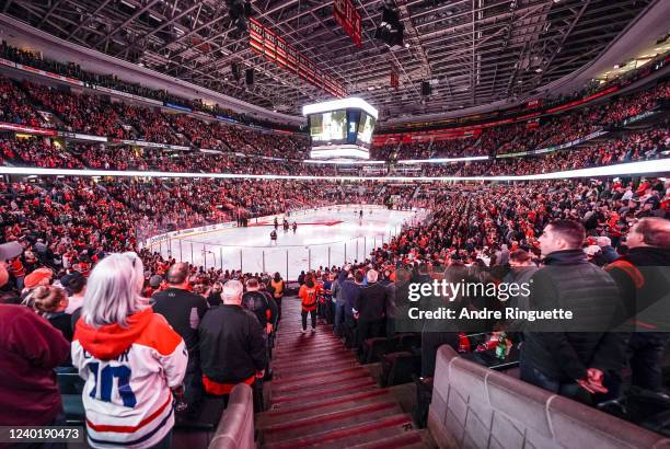 Fans observe a moment of silence in honour of NHL legend Guy Lafleur, who passed away yesterday prior to a game between the Ottawa Senators and the...