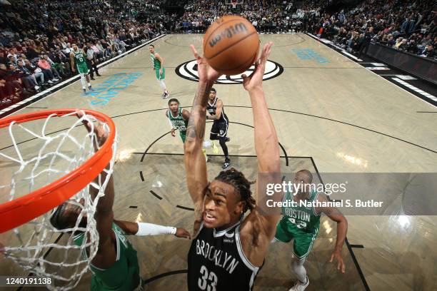 Kyrie Irving of the Brooklyn Nets dunks the ball against the Boston Celtics during Round 1 Game 3 of the 2022 NBA Playoffs on April 23, 2022 at...