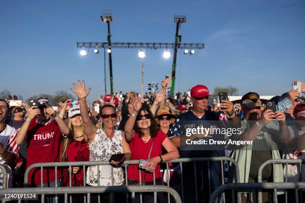 The audience cheers as President Donald Trump arrives during a rally hosted by the former president at the Delaware County Fairgrounds on April 23,...