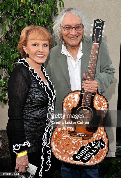 Maria Elena Holly and musician Albert Lee attends a concert in celebration of Buddy Holly's music and legacy held at The Music Box Theatre on...