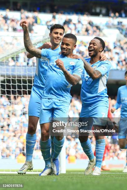 Gabriel Jesus of Manchester City celebrates with Raheem Sterling of Manchester City and Rodri of Manchester City after scoring their 4th goal during...