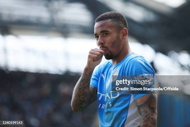 Gabriel Jesus of Manchester City sucks his thumb as he celebrates after scoring their 5th goal during the Premier League match between Manchester...