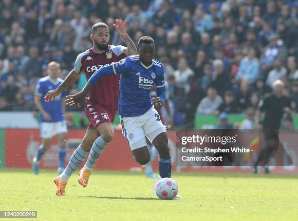 Leicester City's Patson Daka and Aston Villa's Douglas Luiz during the Premier League match between Leicester City and Aston Villa at The King Power...