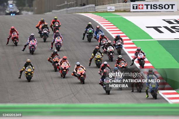 Suzuki Spanish rider Joan Mir leads at the start of the MotoGP race during the Portuguese Grand Prix at the Algarve International Circuit in Portimao...