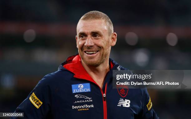 Simon Goodwin, Senior Coach of the Demons looks on after a win during the 2022 AFL Round 06 match between the Richmond Tigers and the Melbourne...