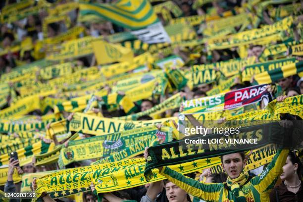 Nantes' supporters cheer on their team prior to the French L1 football match between FC Nantes and FC Girondins de Bordeaux at the Stade de la...