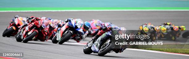 Yamaha French rider Fabio Quartararo leads the race of the MotoGP Portuguese Grand Prix at the Algarve International Circuit in Portimao on April 24,...