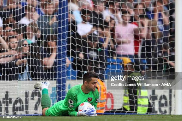 Lukasz Fabianski of West Ham United saves the penalty of Jorginho of Chelsea during the Premier League match between Chelsea and West Ham United at...