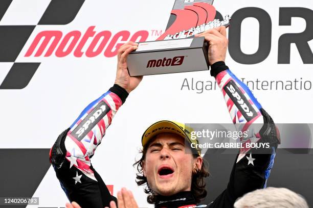 Kalex Italtrans Racing Team US rider Joe Roberts celebrates on the podium after the Moto2 race of the Portuguese Grand Prix at the Algarve...