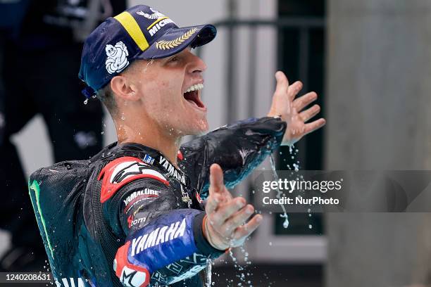 Fabio Quartararo of France and Monster Energy Yamaha MotoGP celebrates the victory in the pool after the race of Grande Premio Tissot de Portugal at...
