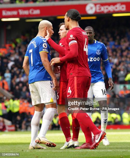 Liverpool's Virgil van Dijk grabs Everton's Richarlison during the Premier League match at Anfield, Liverpool. Picture date: Sunday April 24, 2022.