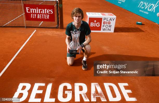 Andrey Rublev of Russia pose with a trophy during the medals ceremony after the Final match against Novak Djokovic of Serbia at the Serbia Open ATP...