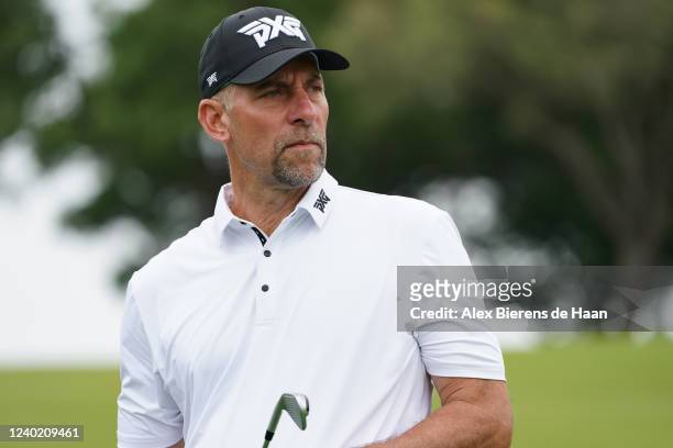 Former MLB pitcher John Smoltz looks on after playing his shot from the first hole fairway during the final round of the ClubCorp Classic at Las...
