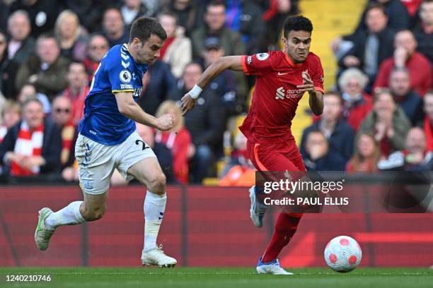 Everton's Irish defender Seamus Coleman vies with Liverpool's Colombian midfielder Luis Diaz during the English Premier League football match between...