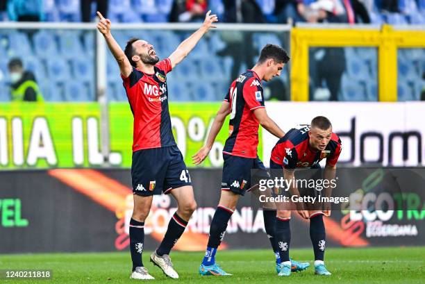 Milan Badelj of Genoa celebrates with his team-mates Filippo Melegoni and Albert Gudmundsson after scoring a goal during the Serie A match between...