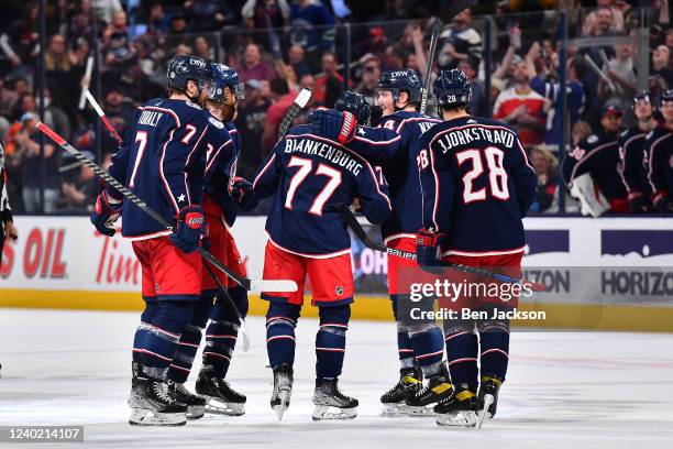 Nick Blankenburg of the Columbus Blue Jackets celebrates his first NHL goal with teammates in the third period against the Edmonton Oilers at...