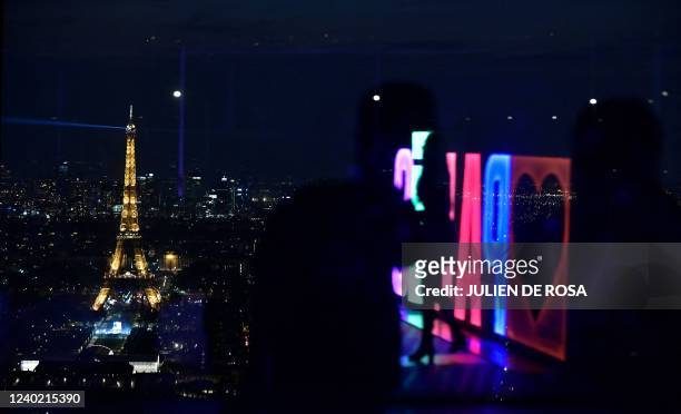 This photograph shows the Eiffel Tower illuminated and the Champ de Mars in Paris, on April 24 after French President and La Republique en Marche...