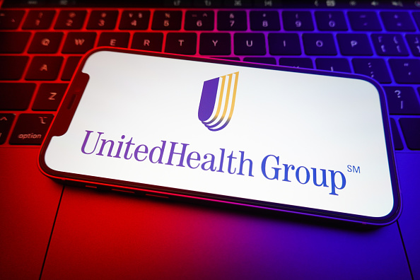 In this photo illustration the UnitedHealth Group logo...