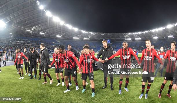 Players of AC Milan celebrate the victory after the Serie A match between SS Lazio and AC Milan at Stadio Olimpico on April 24, 2022 in Rome, Italy.