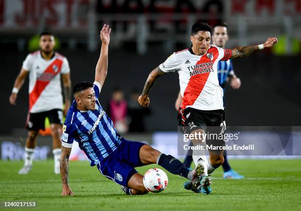 Enzo Perez of River Plate fights for the ball with Ramiro Ruiz Rodriguez of Atletico Tucuman during a match between River Plate and Atletico Tucuman...