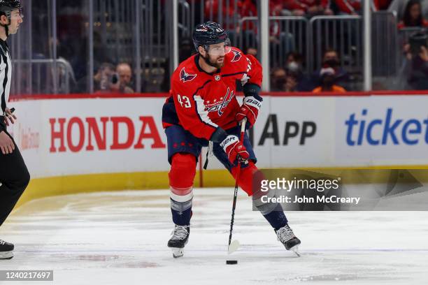 Tom Wilson of the Washington Capitals carries the puck up the ice during a game against the Toronto Maple Leafs at Capital One Arena on April 24,...