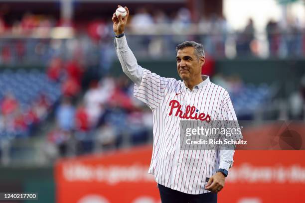Former Villanova Wildcats basketball coach Jay Wright throws out the first pitch before a game between the Milwaukee Brewers and Philadelphia...