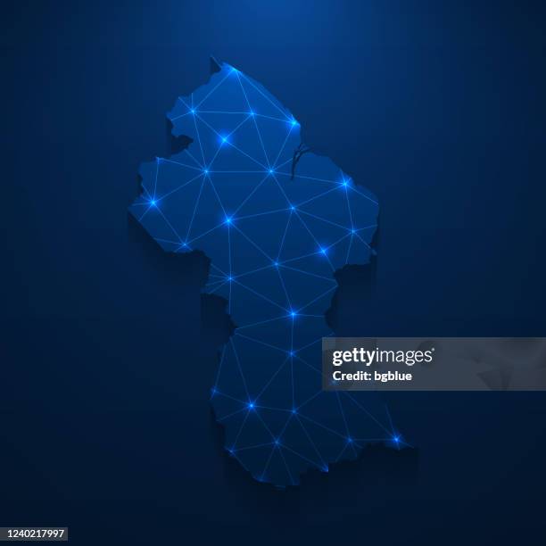 guyana map network - bright mesh on dark blue background - georgetown stock illustrations