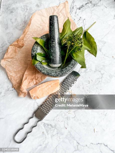 ingredients flatlay in kitchen for homemade ramson pesto - mortar and pestle stock pictures, royalty-free photos & images
