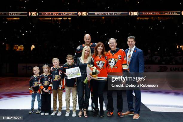 Ryan Getzlaf of the Anaheim Ducks, his children, Paige Getzlaf, Anaheim Ducks owners Susan Samueli and Henry Samueli and Anaheim Ducks Club President...