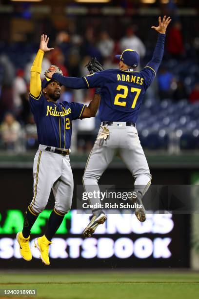 Andrew McCutchen and Willy Adames of the Milwaukee Brewers celebrate after defeating the Philadelphia Phillies 1-0 at Citizens Bank Park on April 24,...