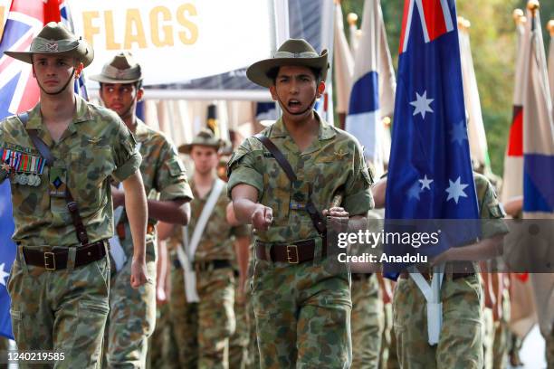 April 25: People participate in the ANZAC Day March in Sydney, on Sunday, April 25, 2022.