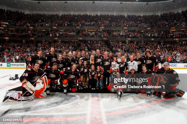 Ryan Getzlaf of the Anaheim Ducks poses for a photo with his family and teammates after his last career NHL game after the game against the St. Louis...